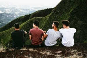 teen-boys-laughing-on-mountain